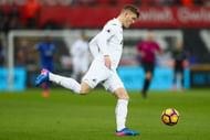 SWANSEA, WALES - FEBRUARY 12:  Alfie Mawson of Swansea City during the Premier League match between Swansea City and Leicester City at Liberty Stadium on February 12, 2017 in Swansea, Wales.  (Photo by Michael Steele/Getty Images)